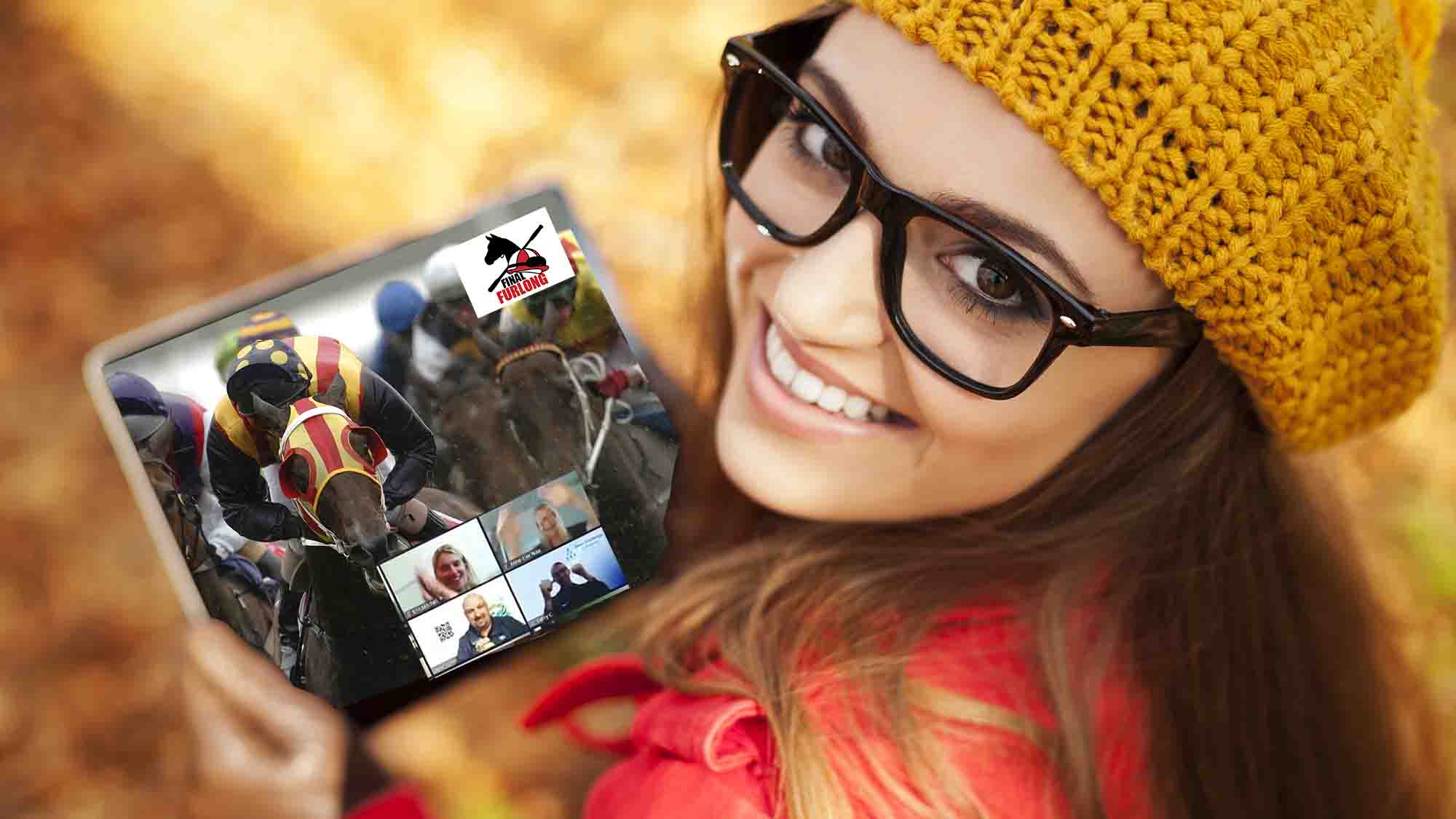 Smiling young woman using digital tablet